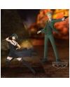 Image de LOID FORGER dans spy x family en costume vert pointant une arme  ainsi que de Yor en rode noir dans spy x family
