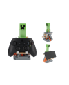 Figurine Creeper Minecraft posée avec manette de jeu