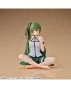 Vue de face de la figurine Übel de Frieren, assise les jambes croisées.